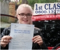 Amy with Driving test pass certificate